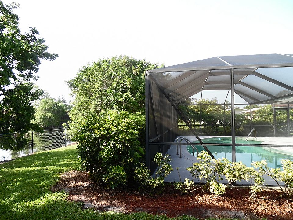 Tranquil pool home on canal