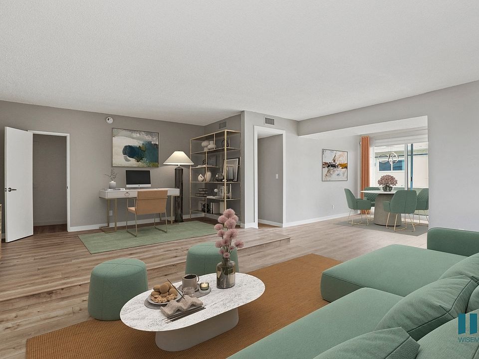 Open-Concept Dining, Living Room, and Office Space