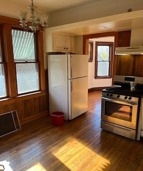 Kitchen view, stove, fridge