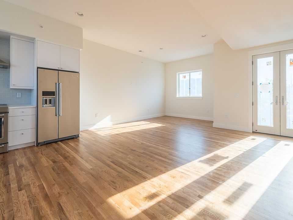 Open living area, wood floors