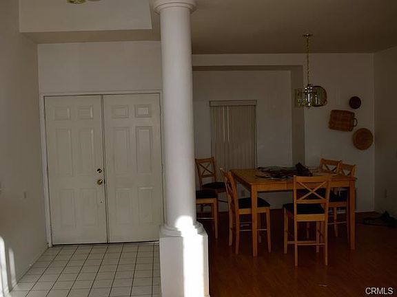 Double-door entry, formal dining room.