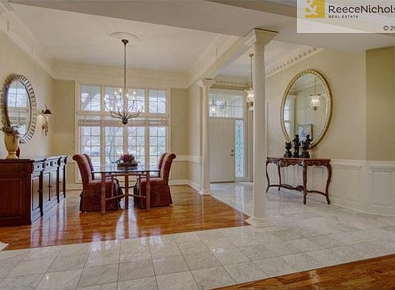 Gleaming hardwood floors and tons of natural light in dining room.