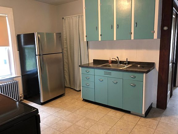 Restored vintage style kitchen with large pantry