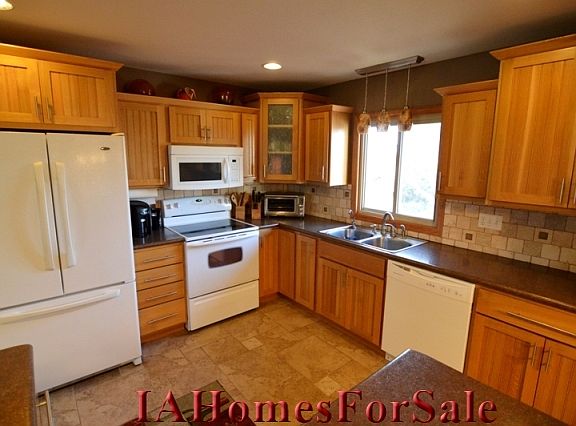 Kitchen: Beautiful tile backsplash and floor