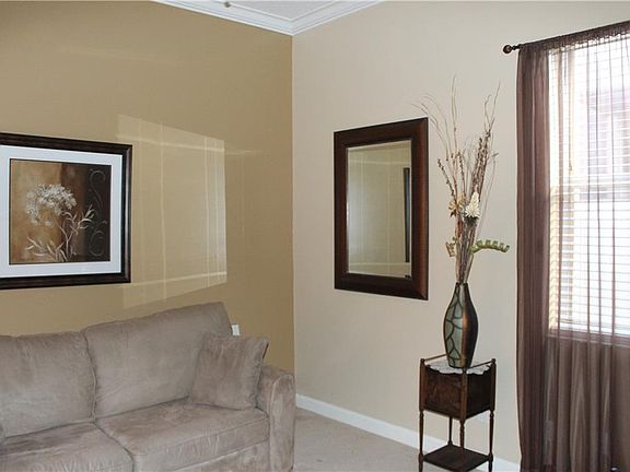 4th image of 705 SW Lake Charles Cir