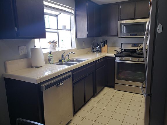 Kitchen with New Stainless Steel Whirlpool Appliances included.