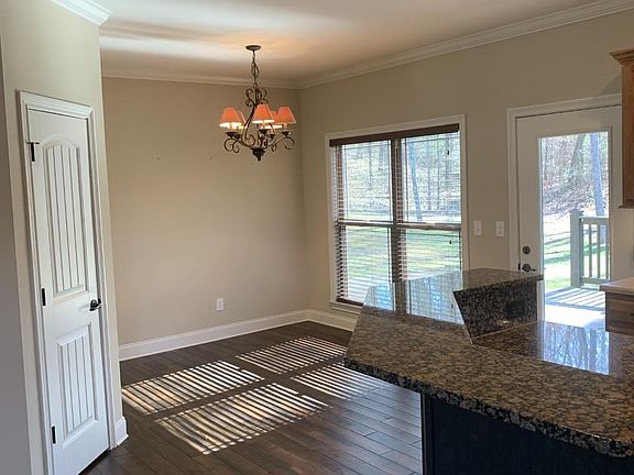 Eat-in kitchen with beautiful view of the PRIVATE backyard