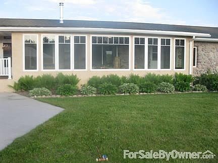 Enclosed Glass/Screen Porch
						:
						Relax and enjoy great sunset views. Electrical outlets throughout.