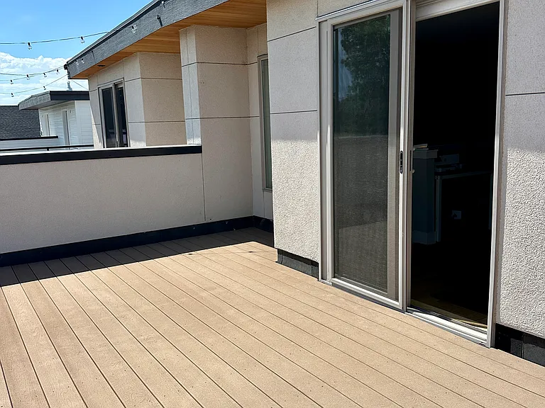 Third floor deck that overlooks downtown Denver & Hallack park.