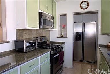 Upgraded Kitchen with  all stainless steel appliances to  stay washer and dryer closet off to the left in its own closet