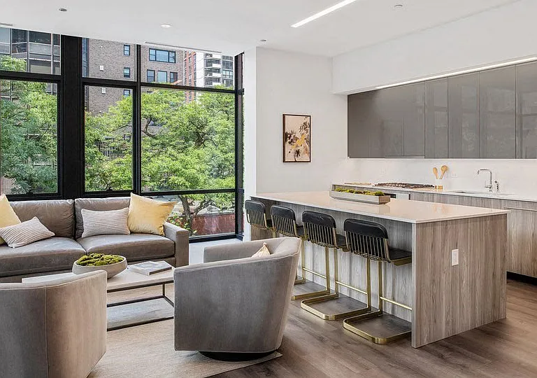 Inspired by rich Art Deco and Mid-Century Modern architecture, 61 Banks Street was meticulously designed by award-winning architect Booth Hansen with interiors by Darcy Bonner.