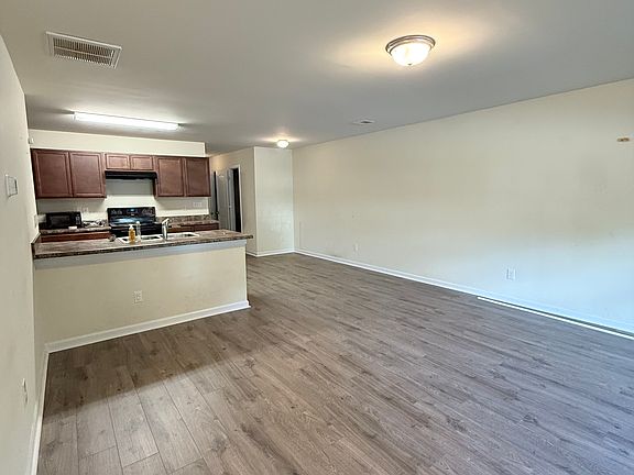Open living room to kitchen