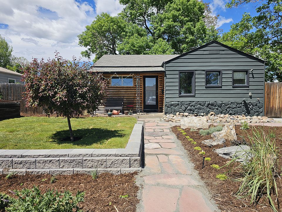 View to front yard, patio & front door from street.