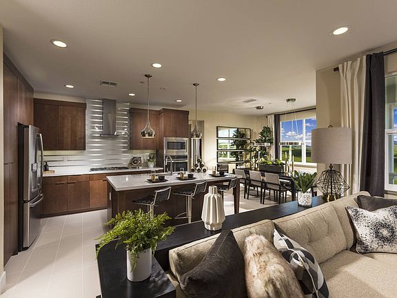 The main living spaces of Homesite 13 are all on one level as shown here in the Plan One model photo