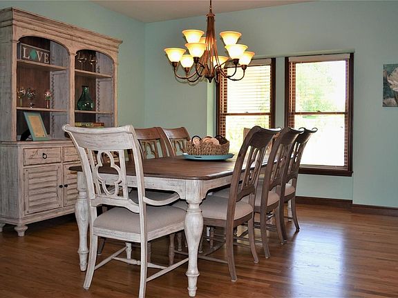 Dining Room will have room for your guests (& beautiful wood floors & windows)!