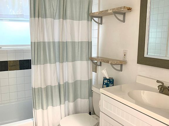 Downstairs condo bathroom.