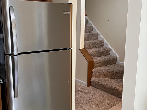 Opening to living area and access to the stairs