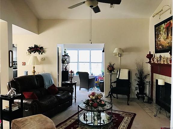 Living room looking into sun room.