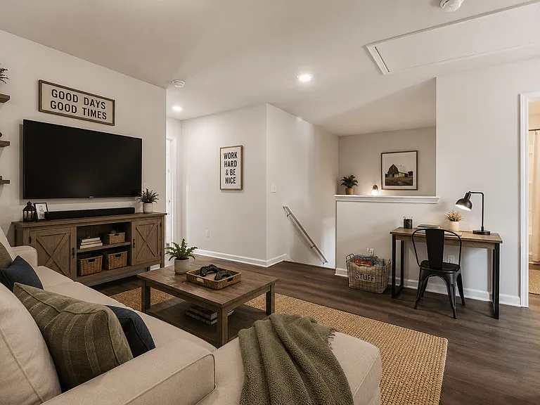 Versatile loft space perfect for a home office, media room, or additional living area.