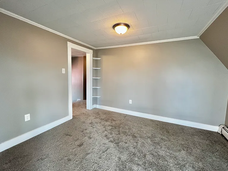 Living Room Area with Built in Shelving