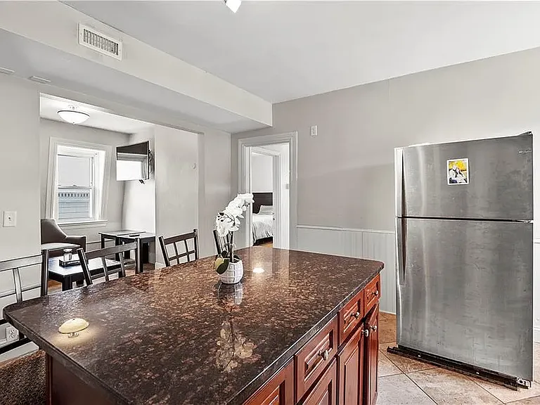 Kitchen looking into living room