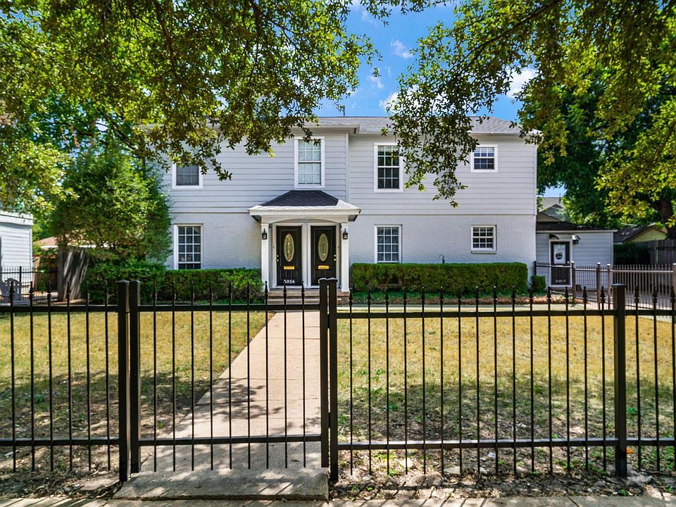 Welcome home! 5054 is the front door on the right. Driveway is double wide for plenty of additional off-street parking space. Carport is in back.