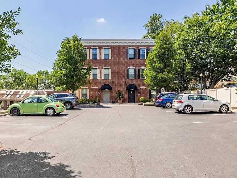 Front of building. 1 parking spot per unit