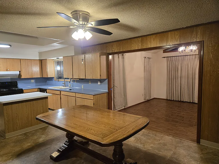 Dining room with view of family room and kitchen