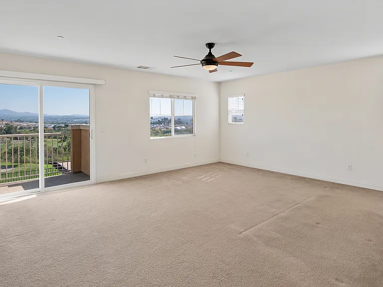 Huge Master Bedroom with fan and private balcony overlooking the Gulf View