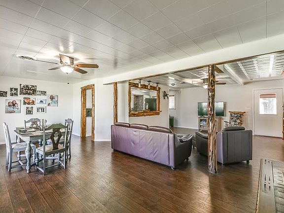 Living room and dining room with rustic touches