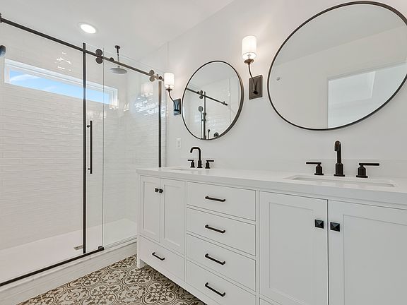 Primary bath with matte black finishes
