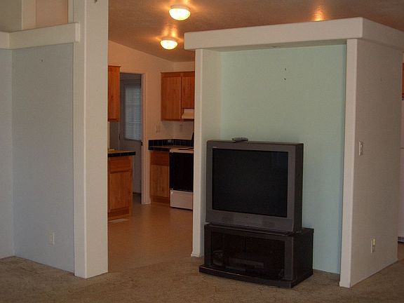 Living room looking into kitchen