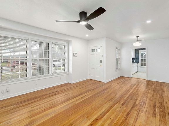 Living room looking towards kitchen and Justin Ln