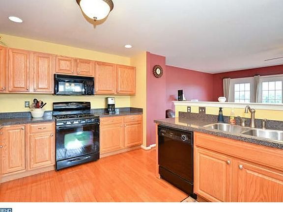 Kitchen opens to Family Room