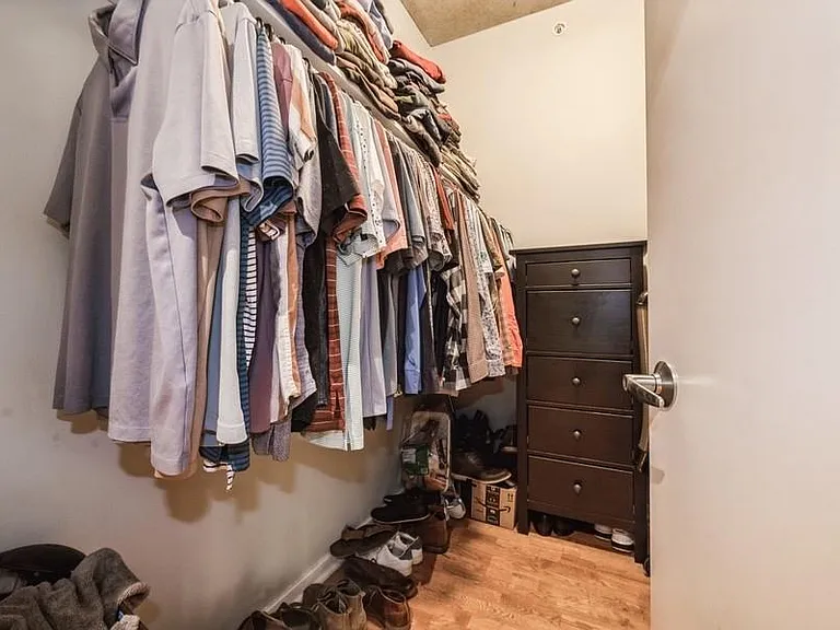 Walk-in closet measures 7'7" x 5'8" and ceiling is approx. 10' tall.