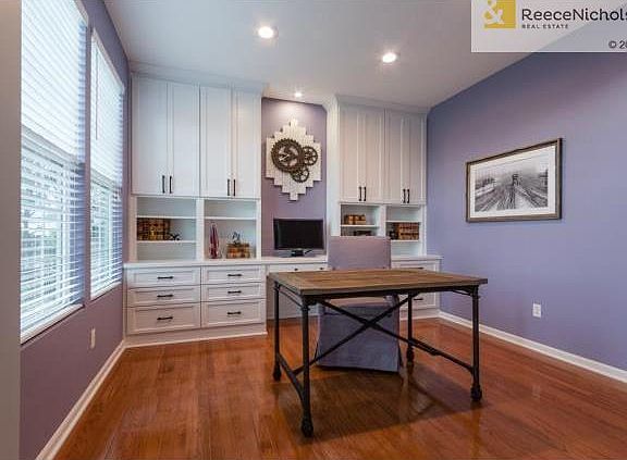 Main floor office with custom built-ins and wires hidden for a f