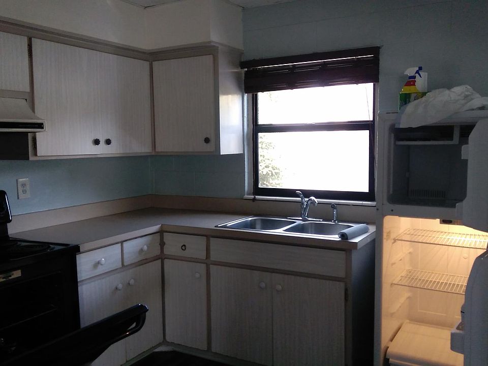 Kitchen with large window overlooking the lake