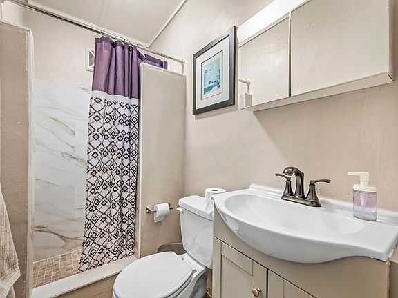 Bath with shower