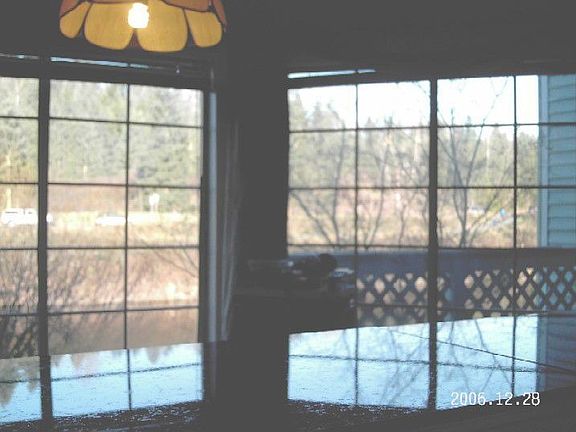 View from Kitchen out to River and Trail
