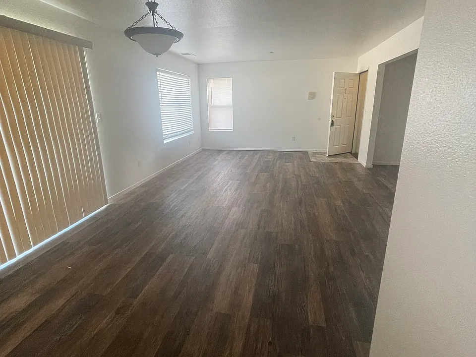 View from Kitchen into the dining and living room.
