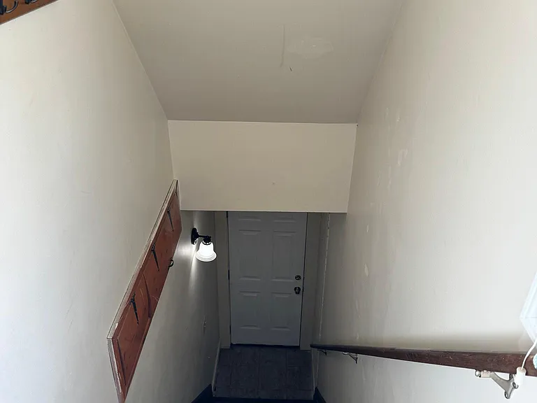Stairway down to front entrance