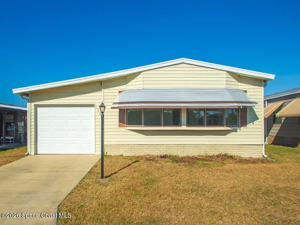 908 Oleander Cir, Barefoot Bay, FL 32976