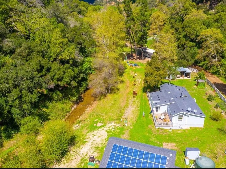 Beautiful canyon setting with creek running the length of the property