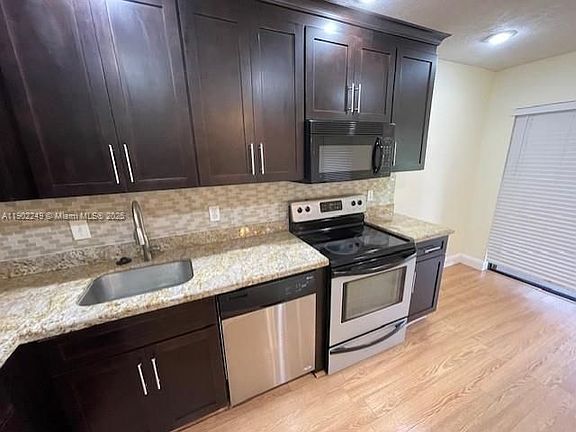 2nd image of 311 NW 103rd Ter #Townhouse