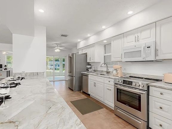 Brand new kitchen. Well lit with plenty of counter space. You will be the first to host family and friends for an epic meal in this kitchen. Pull out double garbage, stainless steel sink with garbage disposal. New refrigerator, stove, dishwasher.