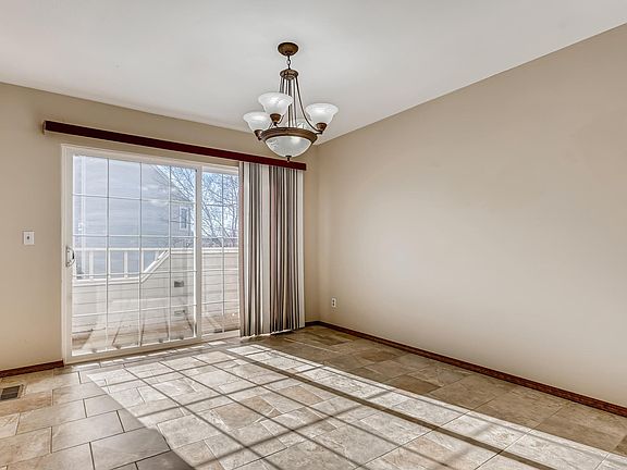 large light dining room opens onto patio