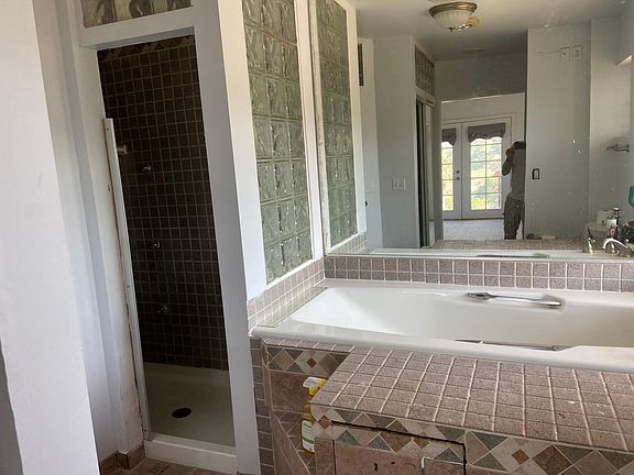Primary Bath Shower and Oversized Tub