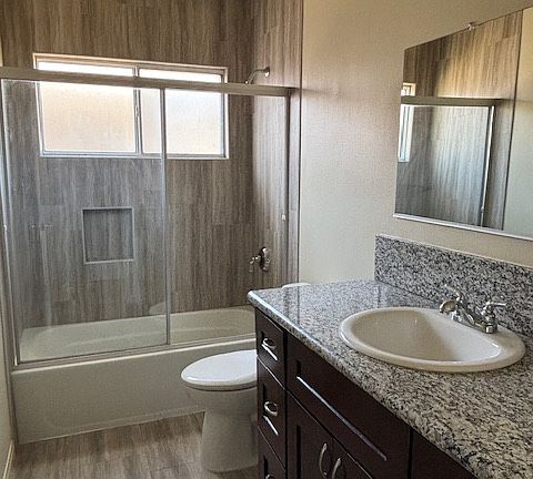 Bright bathroom with lots of storage under cabinet