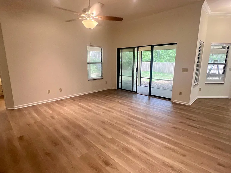 Spacious family room with sliding glass doors to screened lanai