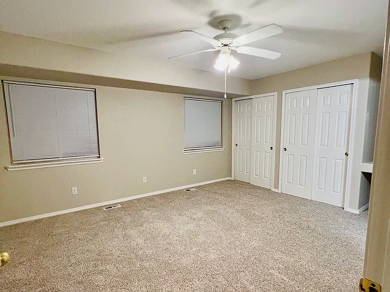 Upstairs primary bedroom, actual unfurnished photo